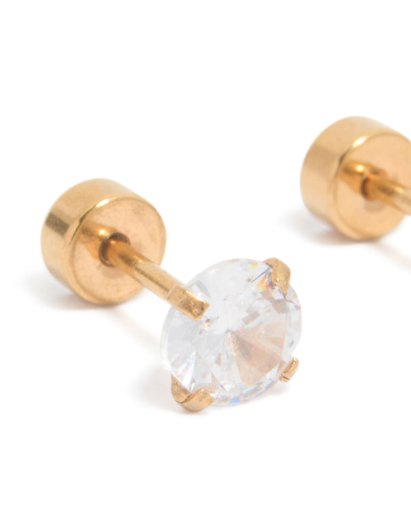 Featuring kids gold plated surgical steel cubic zirconia flat back studs close up view