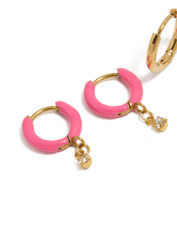 Designed with waterproof gold plated stainless steel pink enamel and cubic zirconia huggie earrings 2-pack close up view