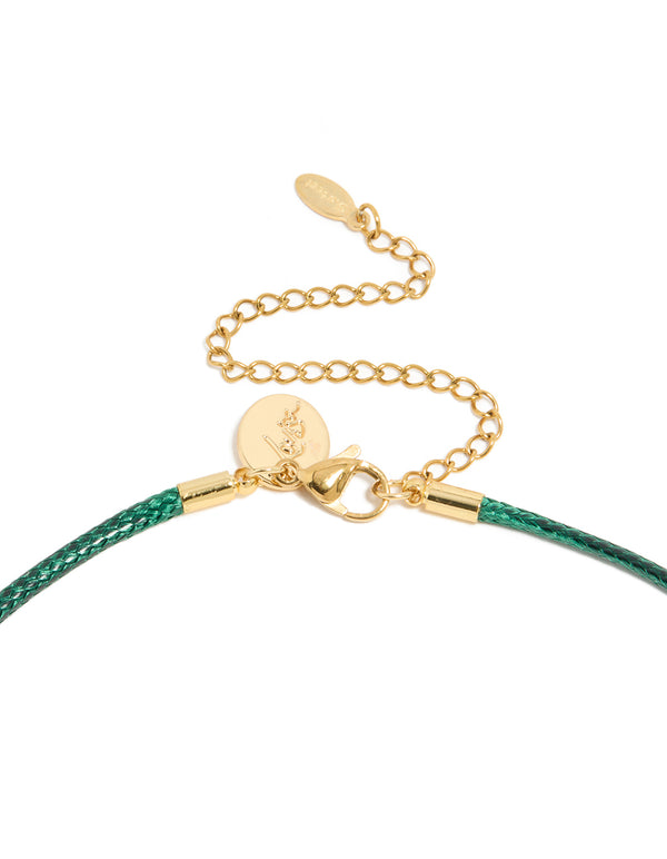 Presenting waterproof necklace clasp detail with adjustable chain in gold plated stainless steel, featuring pear cut cubic zirconia pendant on dark green cord clasp detail view