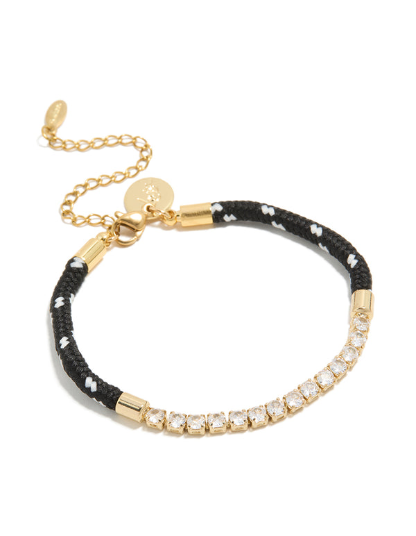 Showcasing a waterproof half tennis and half black cord bracelet crafted from gold plated stainless steel and featuring cubic zirconia stones in a statement style front view