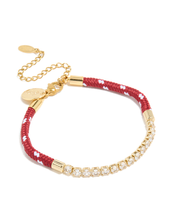 Showcasing a waterproof bracelet crafted from gold plated stainless steel with half tennis design and red cord featuring white accents front view