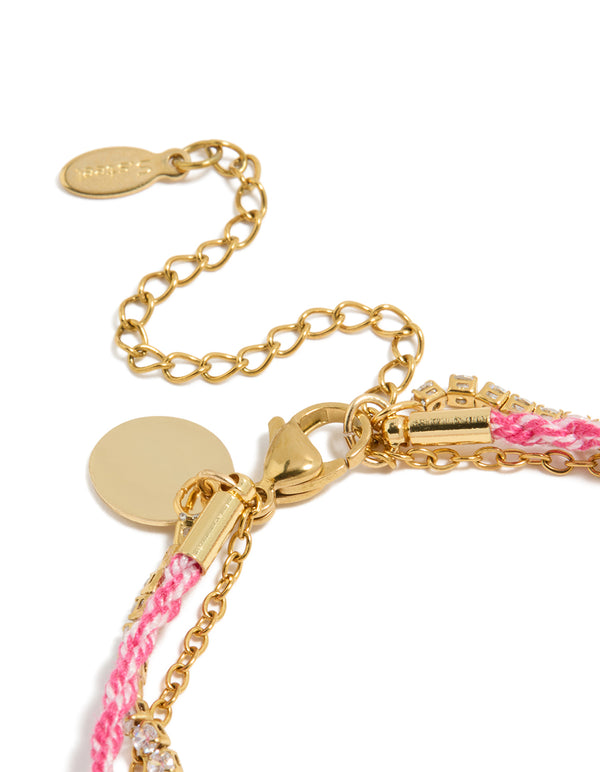 Highlighting waterproof stainless steel tennis bracelet with heart, beads, cubic zirconia, cord, and freshwater pearl accents in pink, white, and gold plated finish closure detail view