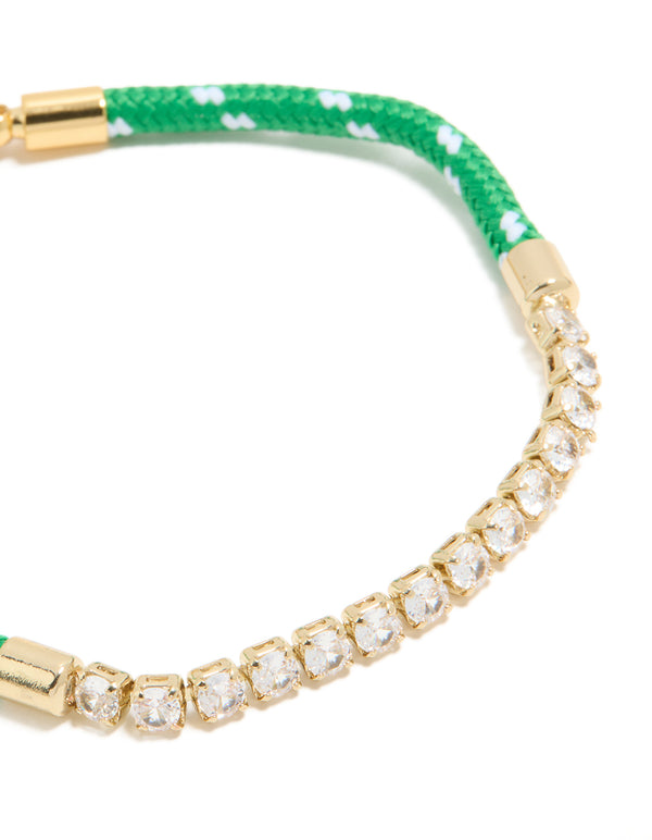 Featuring waterproof gold plated stainless steel half tennis and half vibrant green cord bracelet with white accents and statement style close up view