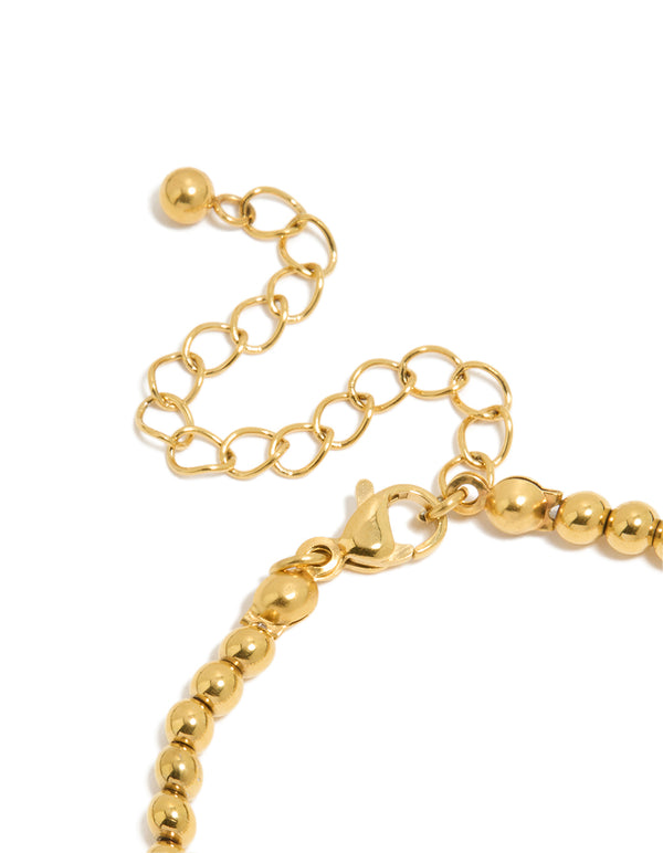 Designed with waterproof gold plated stainless steel freshwater pearl and shell, ball bracelet beads, ocean accents, and statement styling closure detail view