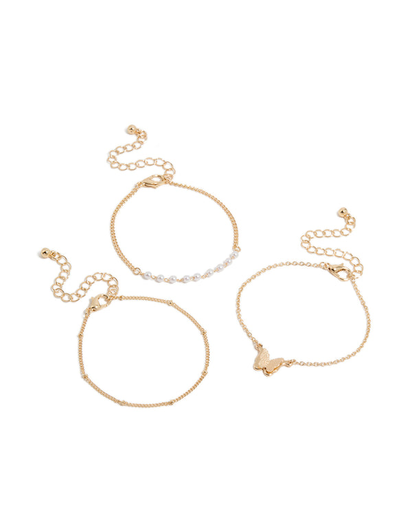Featuring gold butterfly and pearl bracelets in a 3-pack front view