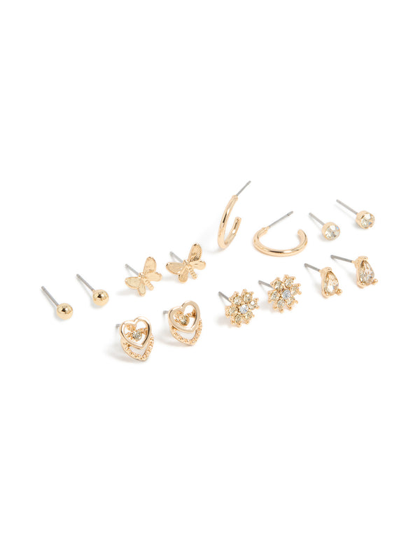 Discover this gold diamante flower ,heart and butterfly design stud earrings 7-pack and stud closure front view