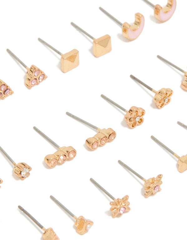 Displayed gold diamante earrings in a 12-pack with celestial, pearl, moon, and floral motifs, enamel material, and stud closure in close up view