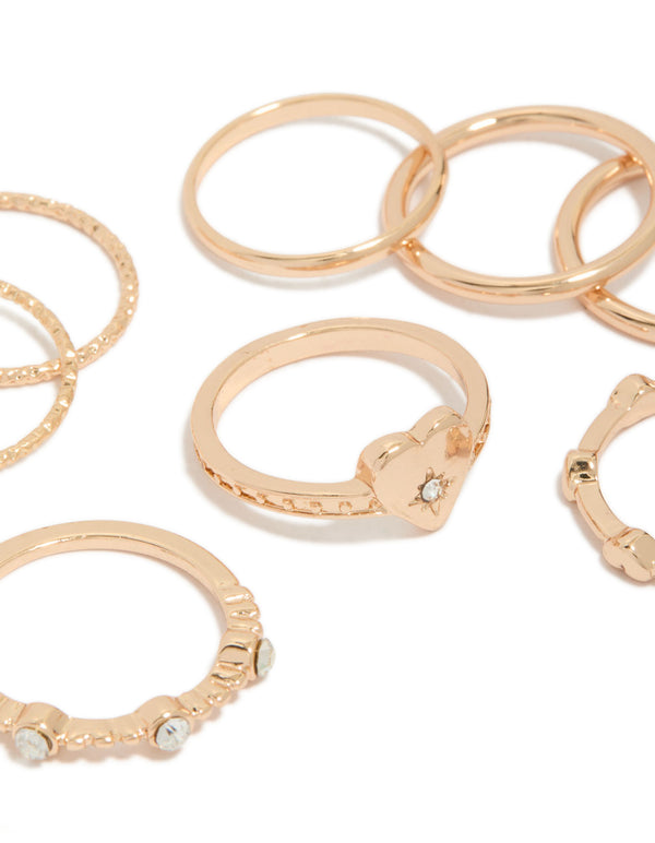 Featuring gold heart diamante band rings 8-pack close up view