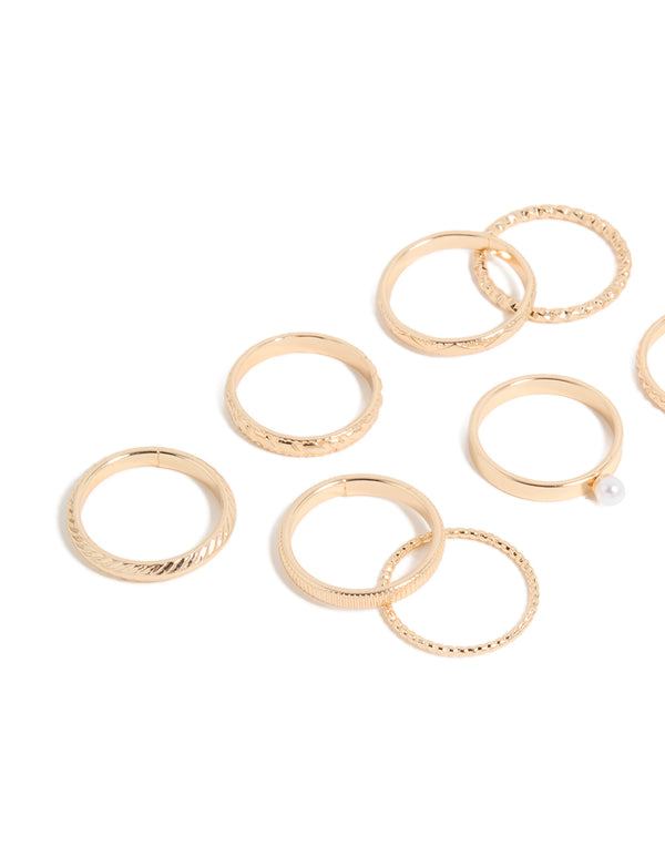 Featuring simple pearl and textured rings 10-pack crafted from gold with stackable statement styling side view