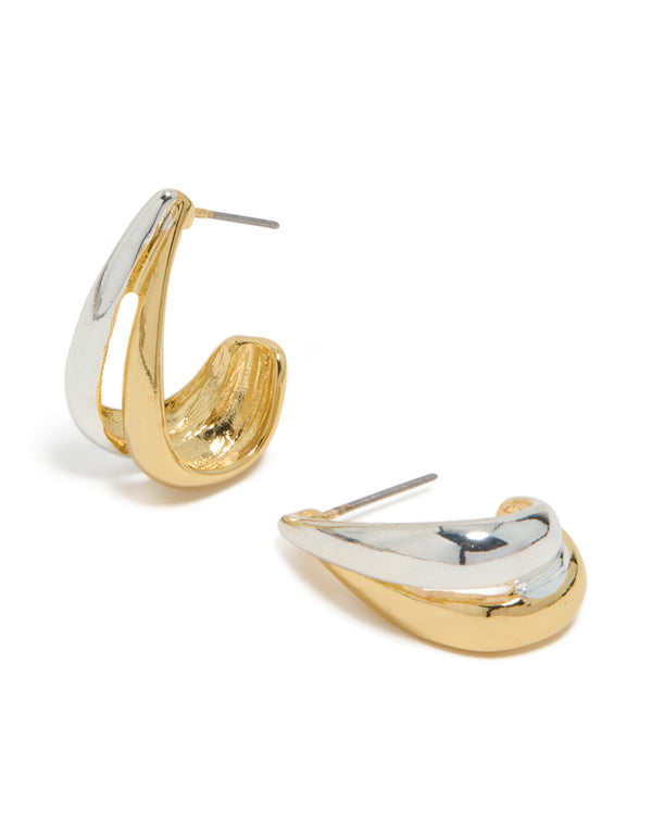 These mixed metal plated layered small hoop earrings feature gold and silver tones front view