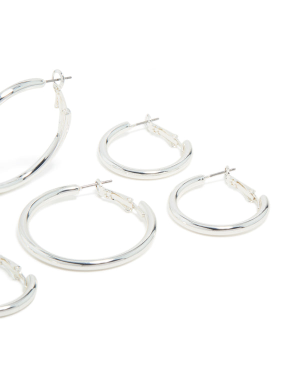 Explore silver plated thick hoop earrings in a statement and chunky 3-pack post detail view