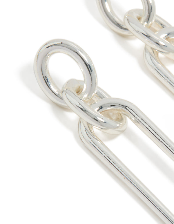 Highlighting large oval link drop earrings in statement style with silver plated finish close up view