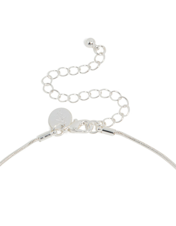 Shop this long organic pendant necklace with plated material in a polished finish clasp detail view