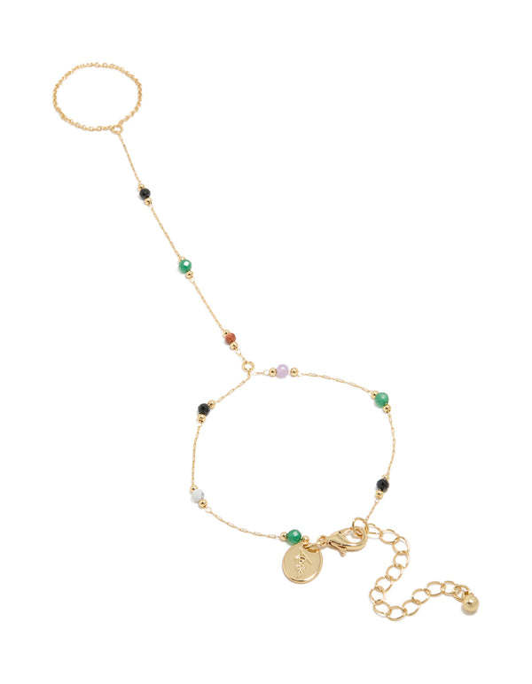 Showcasing a gold plated multicoloured semi precious stone beaded hand chain in statement style front view