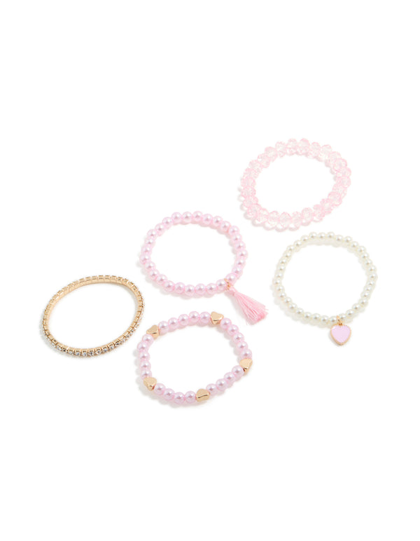 Displaying kids beaded pearl and heart stretch bracelets in a 5-pack and tassel accents in gold, light pink, ivory, and salmon tones front view