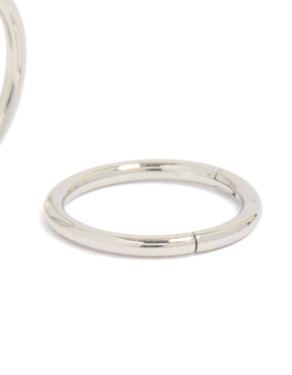 Crafted from surgical steel, 8 mm thick sleeper hoop earrings in silver with chunky styling post detail view