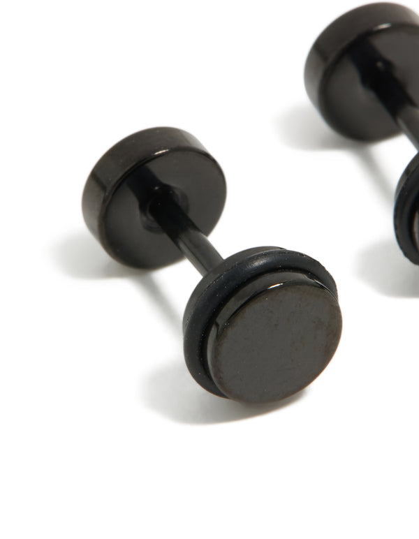 Highlighting black coated surgical steel disc flat back studs with polished surface close up view