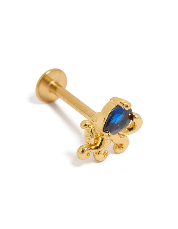 Discover this ocean-inspired octopus stud earring featuring gold plated surgical steel with royal blue cubic zirconia and flat back closure front view