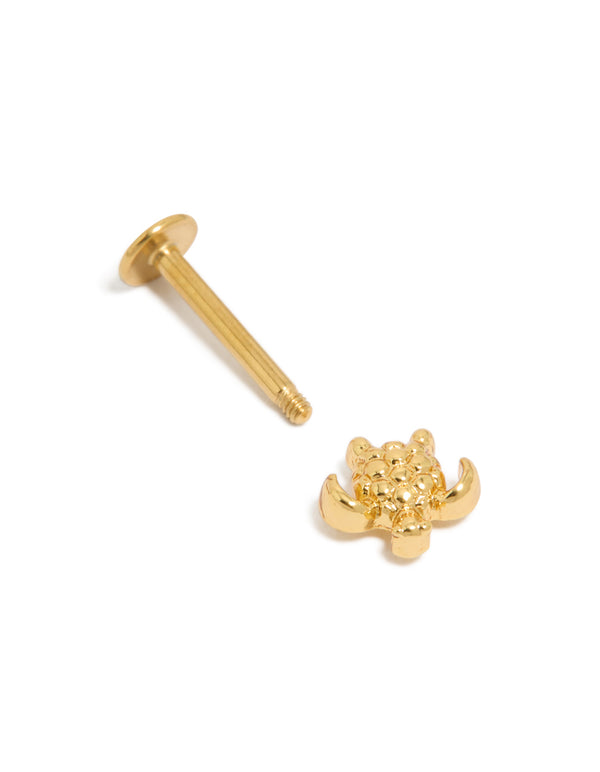 Designed with a flat back closure, this gold plated surgical steel turtle stud earring featuring ocean design details post detail view