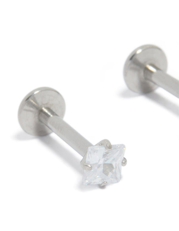 Crafted from surgical steel 3 mm cubic zirconia square flat back studs with clear stones close up view