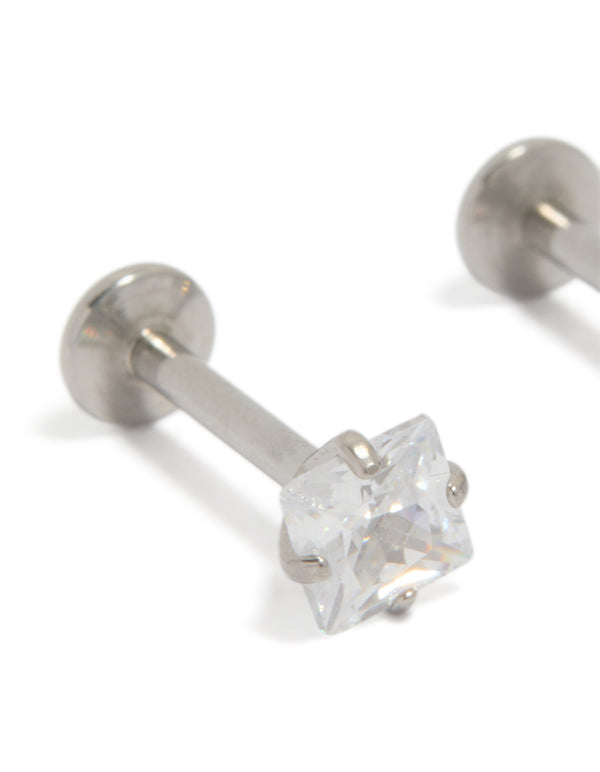 Showcasing 4 MM square cubic zirconia flat back studs in surgical steel close up view