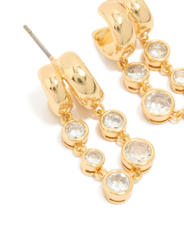 Featuring gold plated cubic zirconia bezel double hoop drop earrings close up view