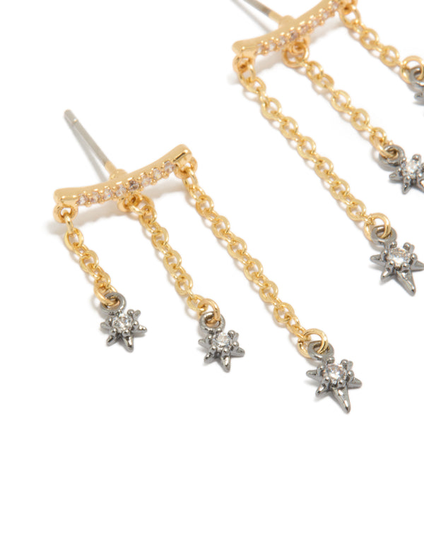 Featuring mixed metal plated cubic zirconia star chain earrings with charm and celestial details in gold, silver, and clear tones close up view