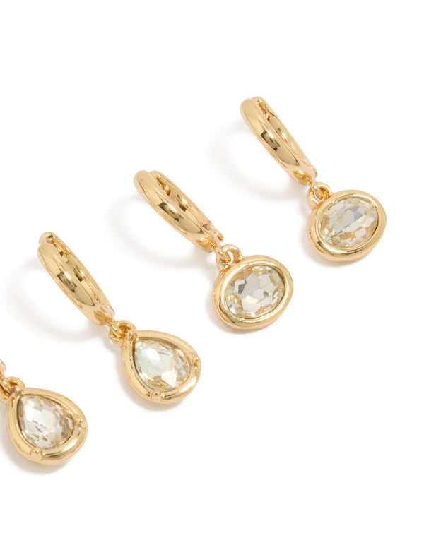 Designed with gold plated cubic zirconia large bezel set studs and huggie earrings in a 3-pack post detail view