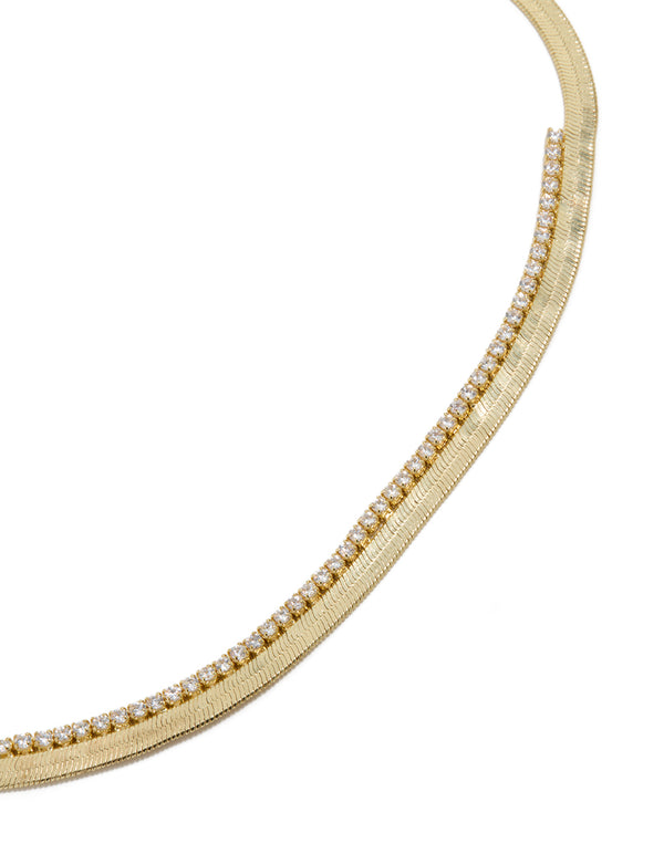 Elegant gold plated cubic zirconia necklace featuring snake chain in statement style close up view