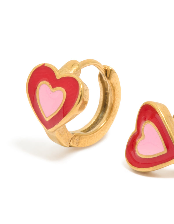 Showcasing kids gold plated surgical steel heart sleeper earrings in crimson and pink close up view