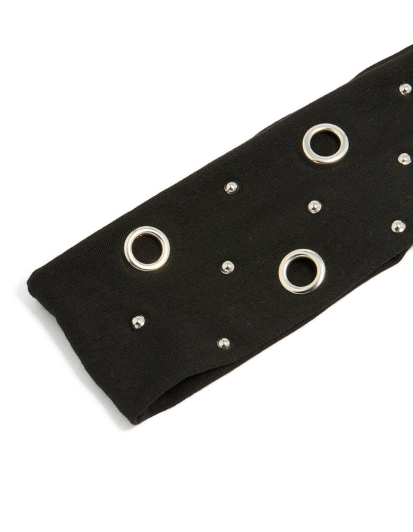 Featuring a black eyelet wide stretch fabric headband in solid print with silver accents detail view