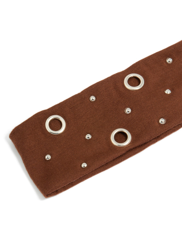 Elegant brown eyelet wide stretch fabric headband with silver embellishments detail view