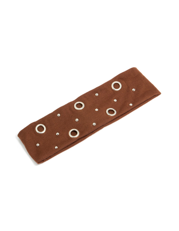 Stylish brown eyelet wide stretch fabric headband featuring silver accents front view