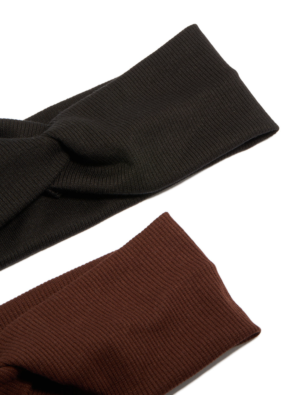 Crafted from solid ribbed slim stretch material, these chocolate brown and black headbands come in a 2-pack detail view