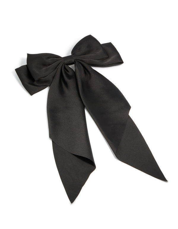 Crafted with a bow design in solid black this hair clip front view