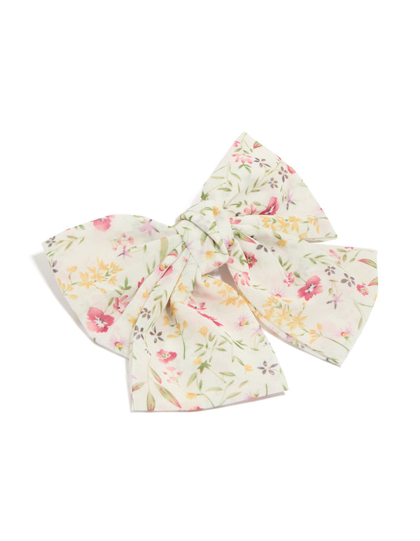 Showcasing a bow clip featuring floral print with leaf accents in ivory, pink, light goldenrod yellow, and olive front view