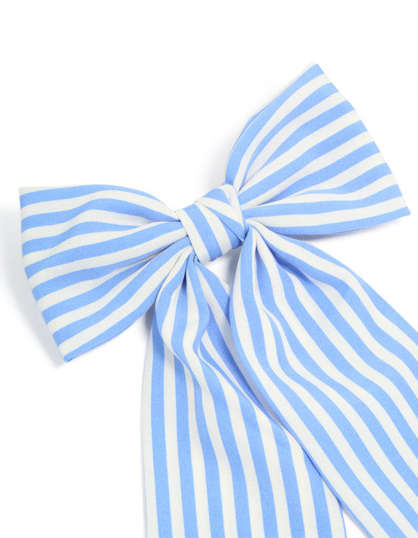 Crafted from fabric, this bow hair clip showcases a striped design in light blue and white detail view