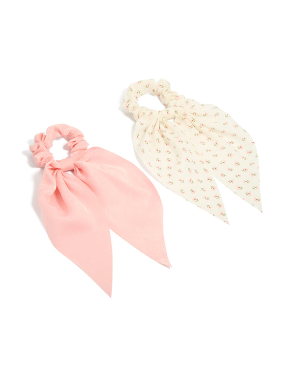 Printed flowers and pink fabric scarf scrunchies featuring bow detail in floral pattern and 2-pack in light pink, ivory, pink, and olive front view