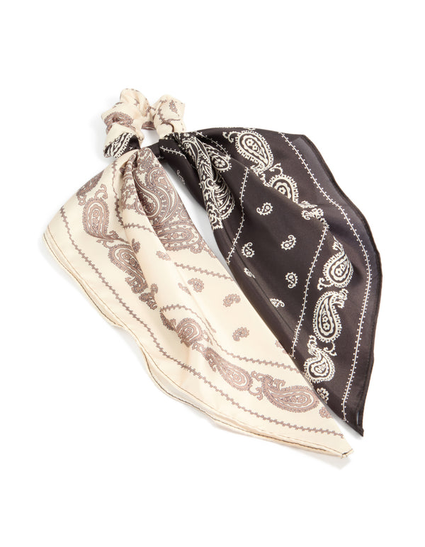 Showcasing a chocolate and cream paisley printed fabric long scarf scrunchie with statement styling front view
