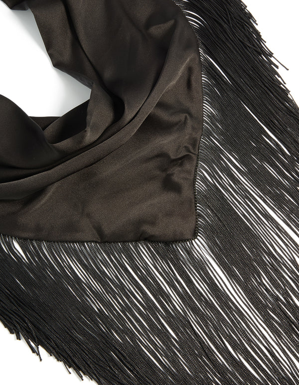 Elegant tassel fringe scarf in solid black fabric detail view