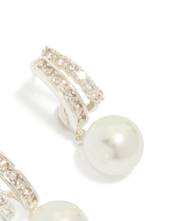 Designed with silver plated cubic zirconia illusion pearl drop earrings and hoop closure post detail view