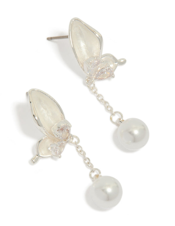 Showcasing silver plated enamel butterfly pearl drop earrings with charm accents in ivory and light pink front view