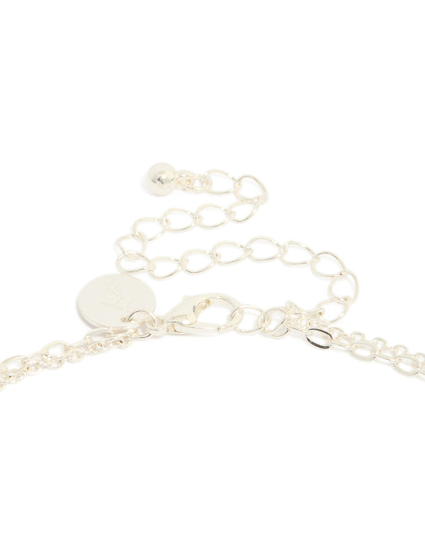 Showcasing cubic zirconia statement layered Y-necklace clasp detail view