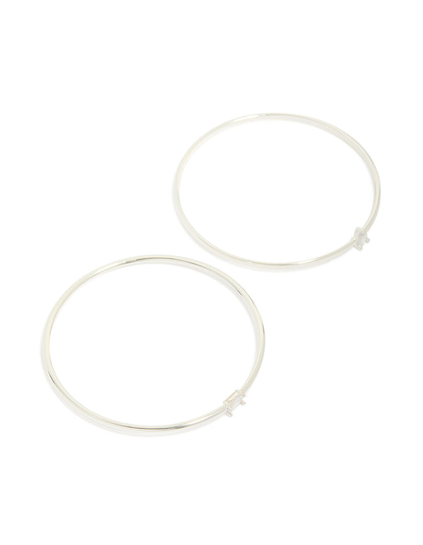 Beautifully crafted silver plated rectangular and teardrop cubic zirconia bangles in a 2-pack front view