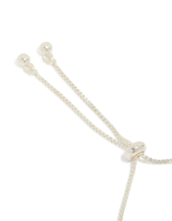 Highlighting the silver plated cubic zirconia vine leaf toggle bracelet in a statement style closure detail view