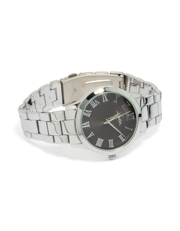 Featuring a men's silver classic round watch with roman numeral black dial, link band, and formal analog design front view
