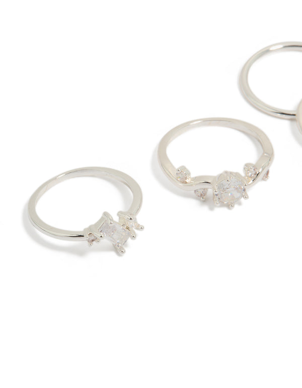 Showcasing silver plated cubic zirconia marquise leaf rings 4-pack with crystal and clear stone accents close up view