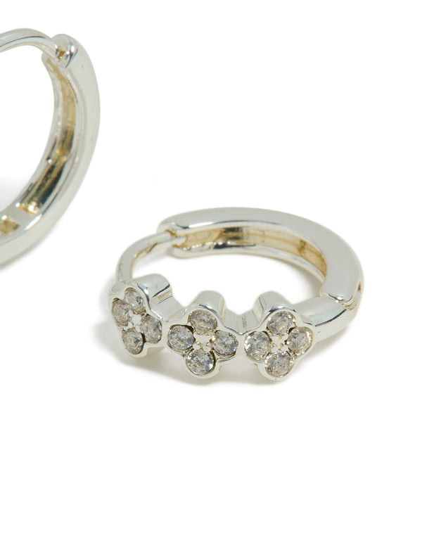 Explore dainty waterproof stainless steel cubic zirconia triple flower huggie earrings designed with crystal embellishments in silver post detail view