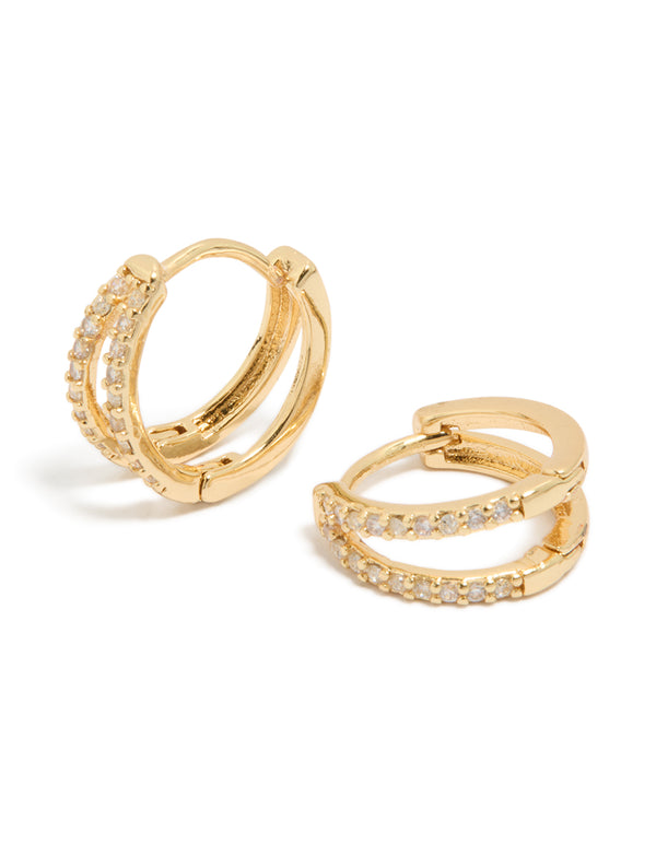 Showcasing small double layered huggie earrings with cubic zirconia in silver front view