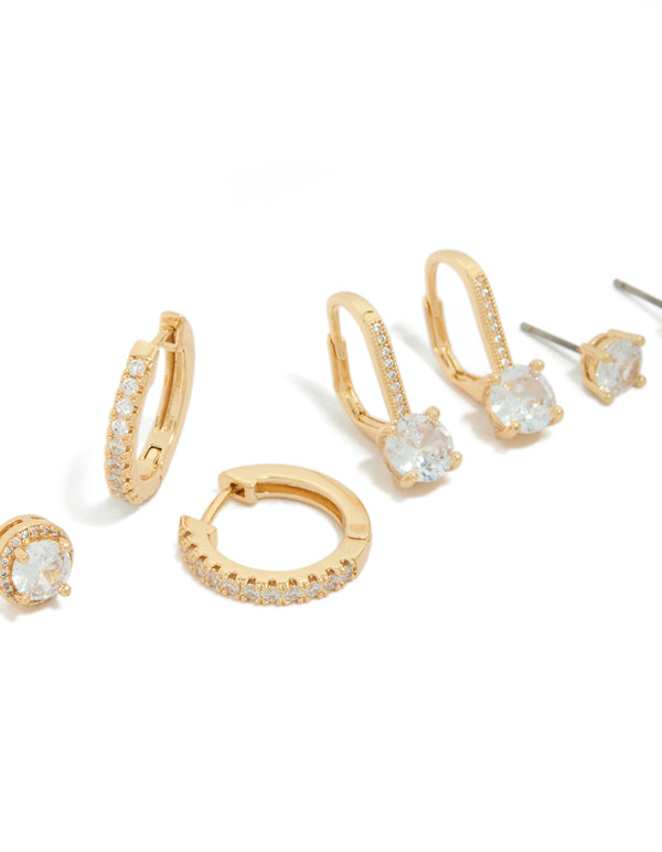 Showcasing gold plated cubic zirconia mixed stud and huggie earrings in a 4-pack with crystal details and huggie closures post detail view